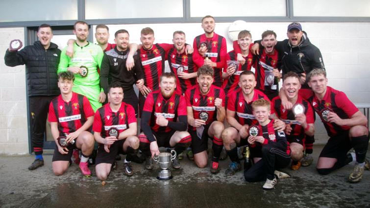 Goodwick United celebrate retaining the title with a win against Milford United at Phoenix Park